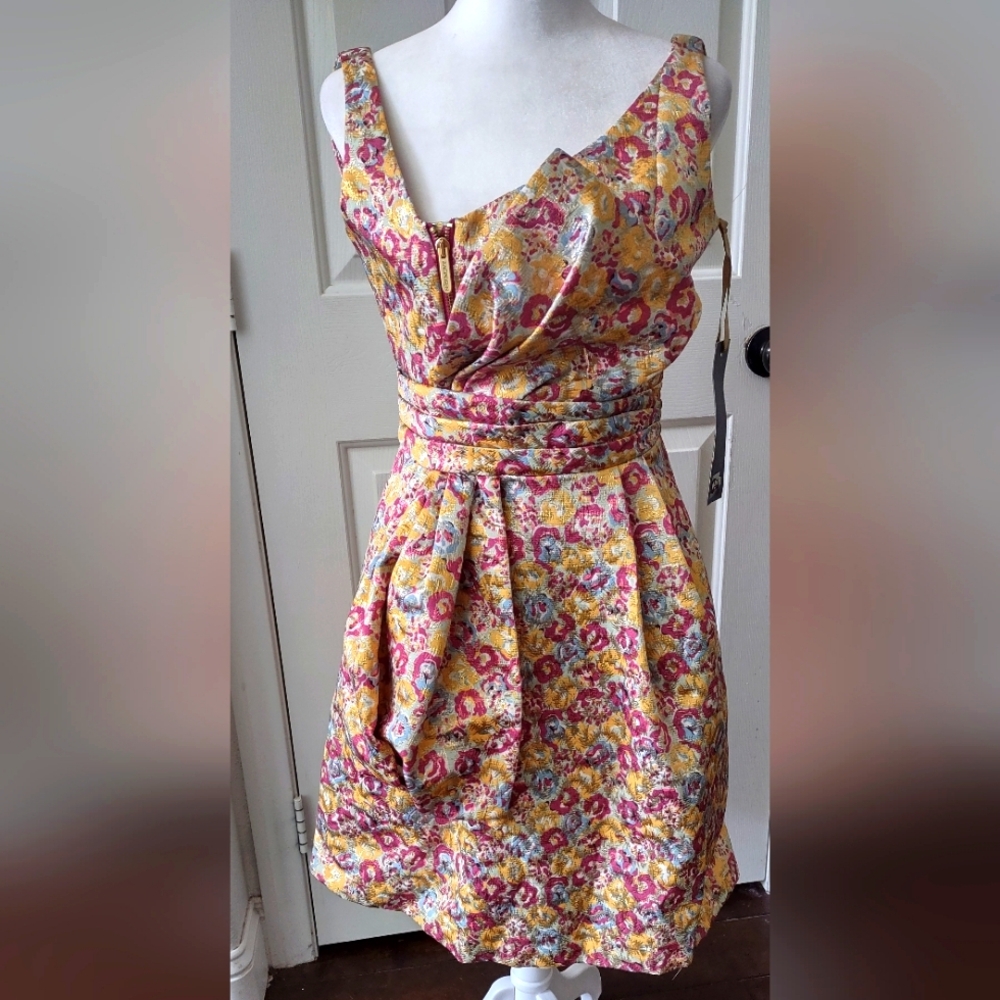 Brocade Cocktail Dress with Large Bow Accent and Gold Zipper in Front